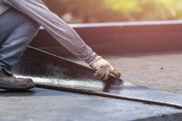 Professional Waterproofing technician working in Brownsville, PA